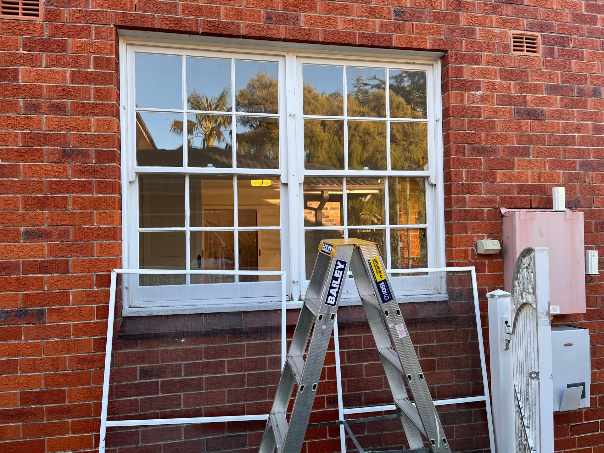 Residential window and brick wall after Washlord clean