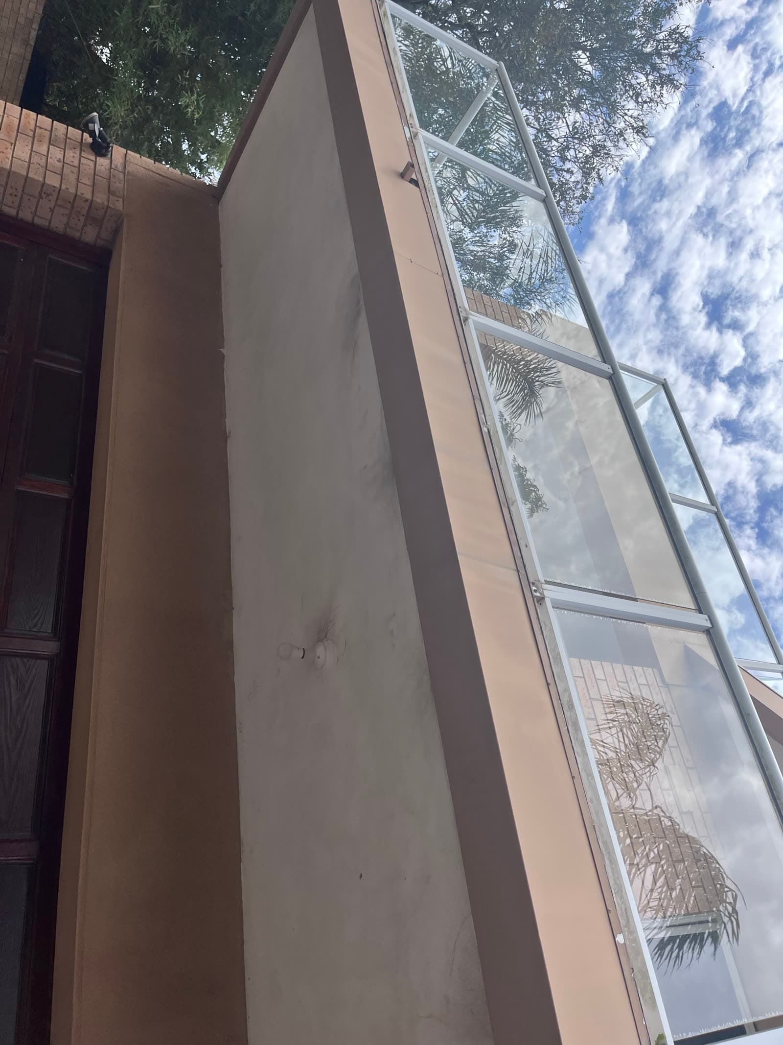 Strata balcony floor and glass balustrade after Washlord clean