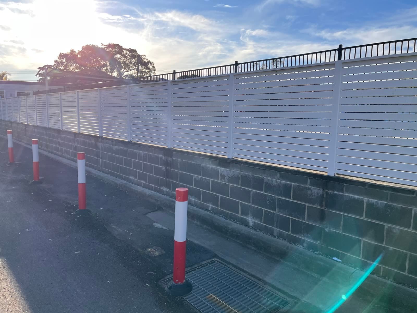 Commercial carpark and bollard clean at golden hour — Northern Beaches