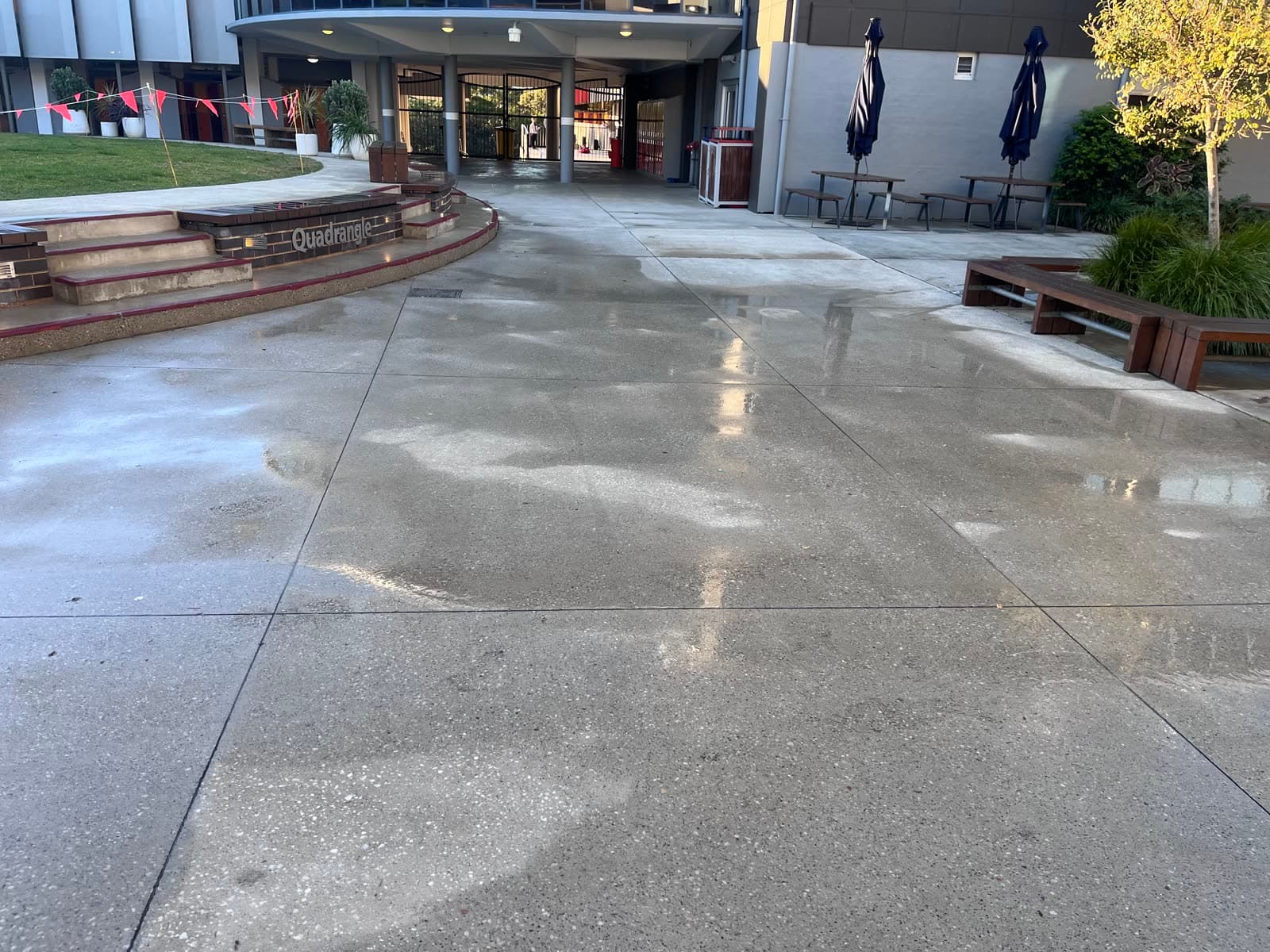 Commercial school quadrangle gleaming after Washlord pressure clean