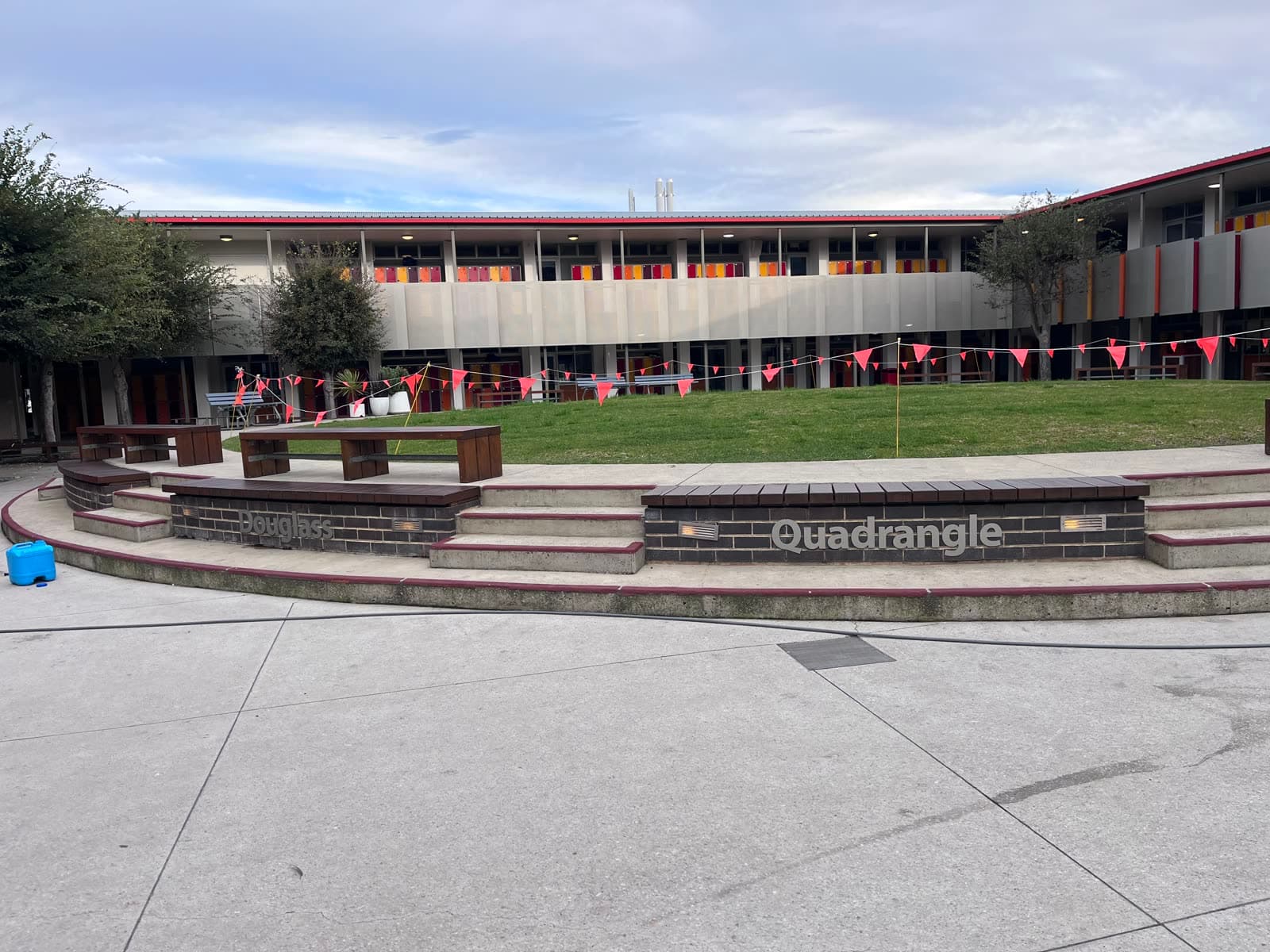 Commercial school quadrangle concrete before pressure cleaning — Northern Beaches
