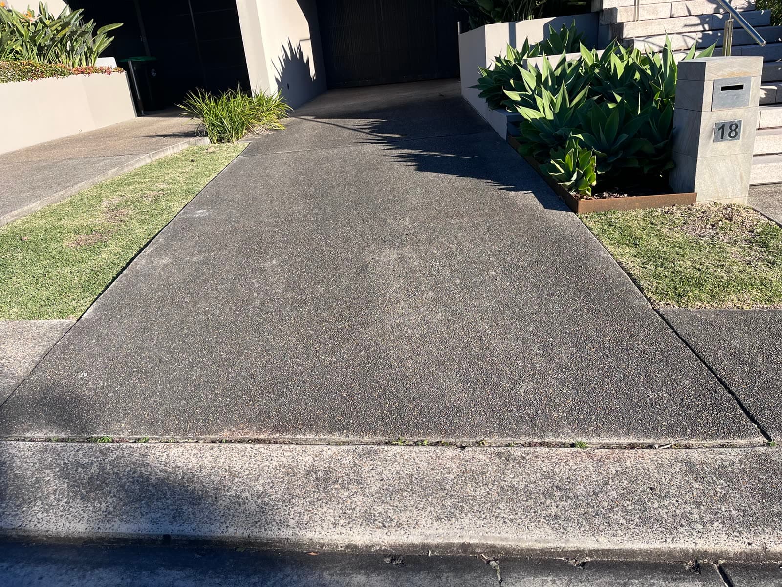 Exposed aggregate driveway before pressure cleaning — Northern Beaches Sydney