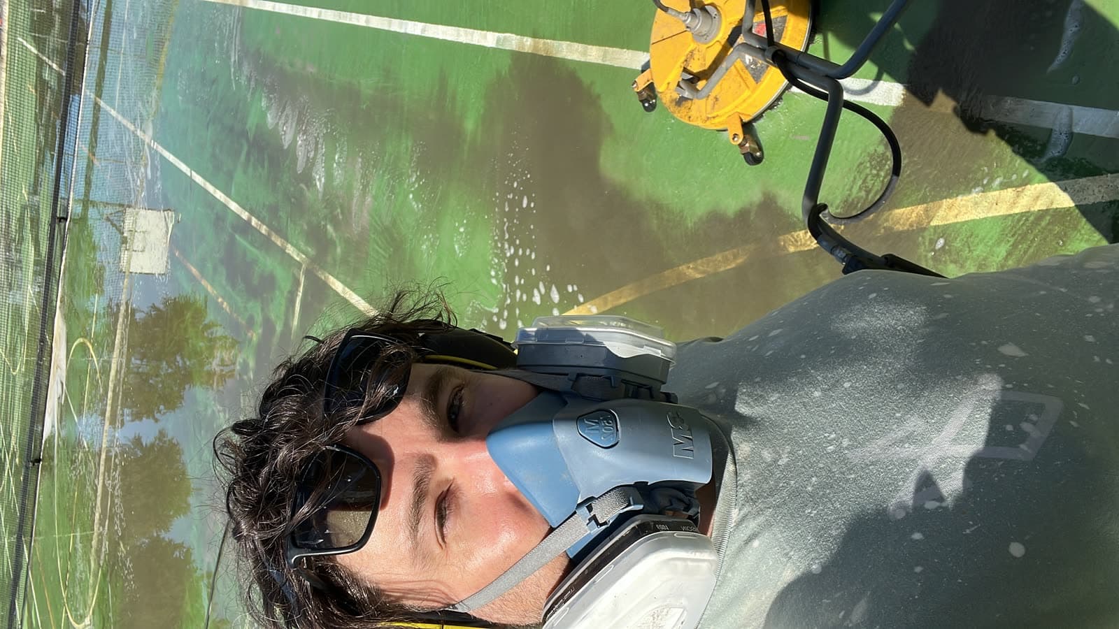 Washlord operator pressure washing with rotary surface cleaner — Northern Beaches commercial job