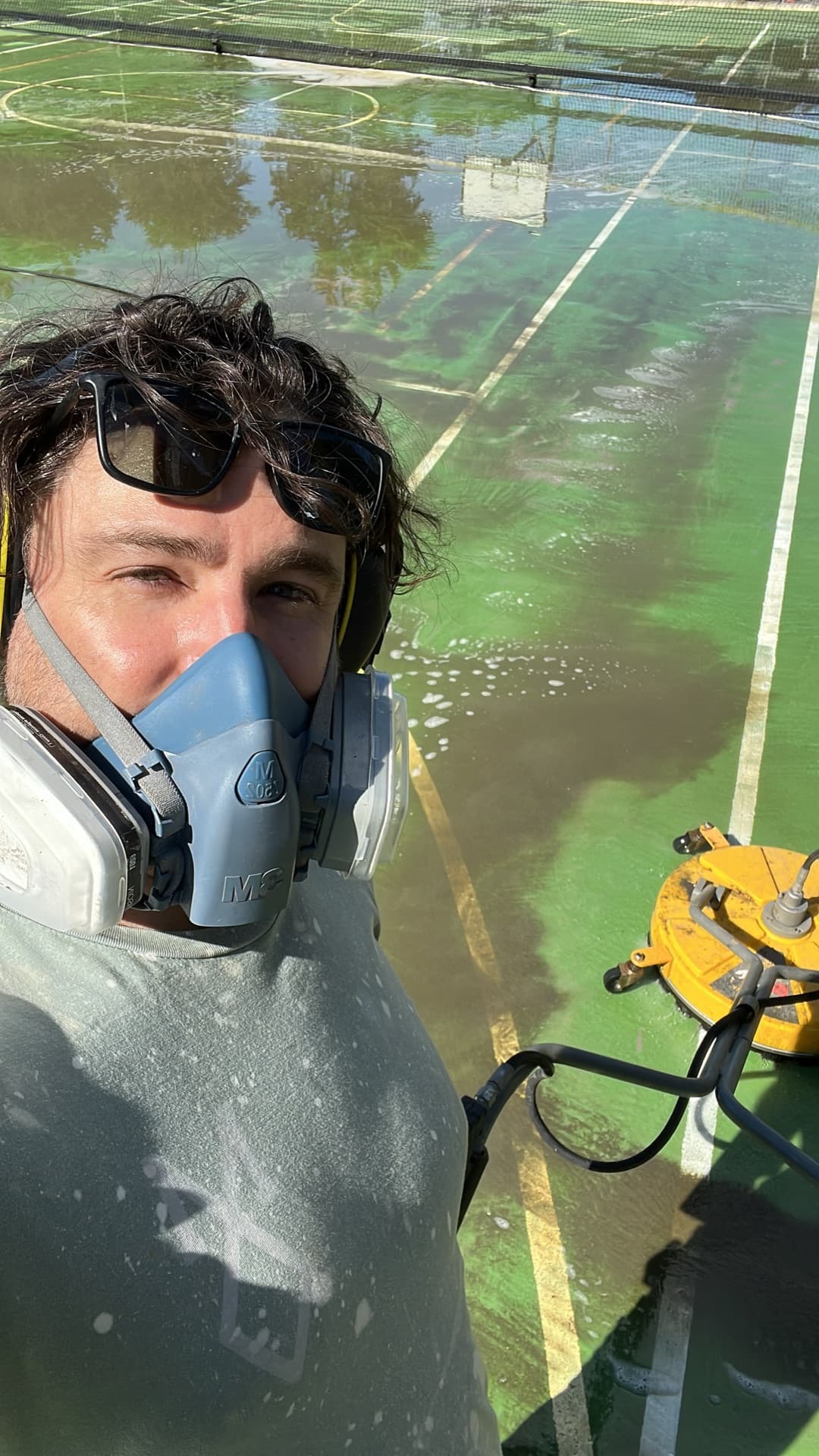 Tennis court pressure clean with rotary surface cleaner