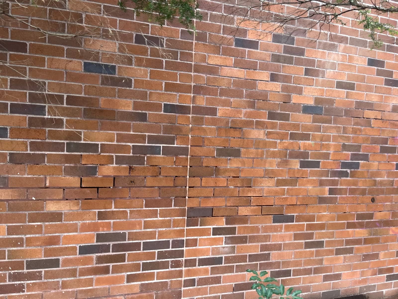 Brick wall restored after graffiti removal — Northern Beaches